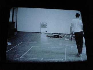 Bruce Nauman- Walking in an Exaggerated Manner around the Perimeter of a Square